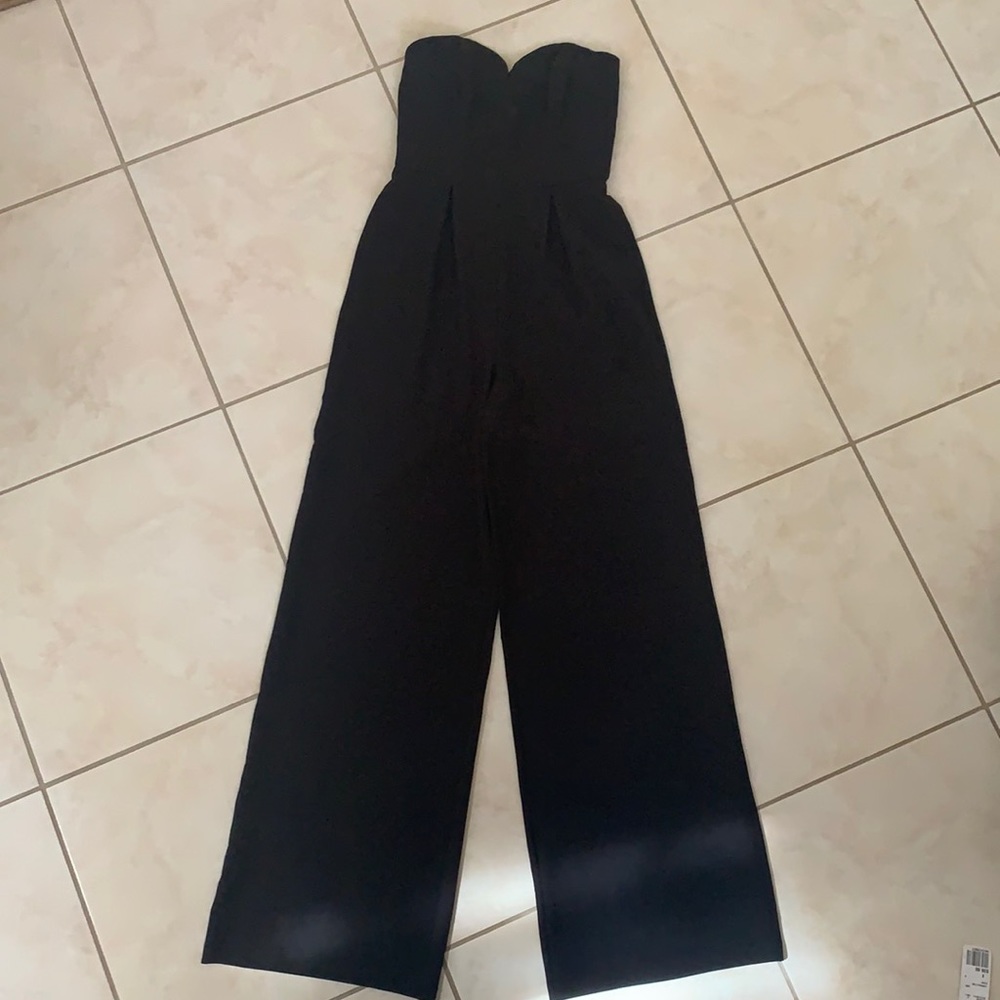 Black strapless jumpsuit with pockets